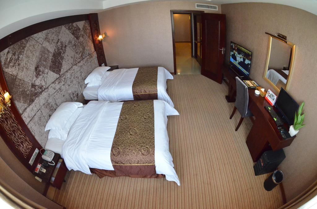 Xiamen Wanjia Oriental Hotel Habitación foto